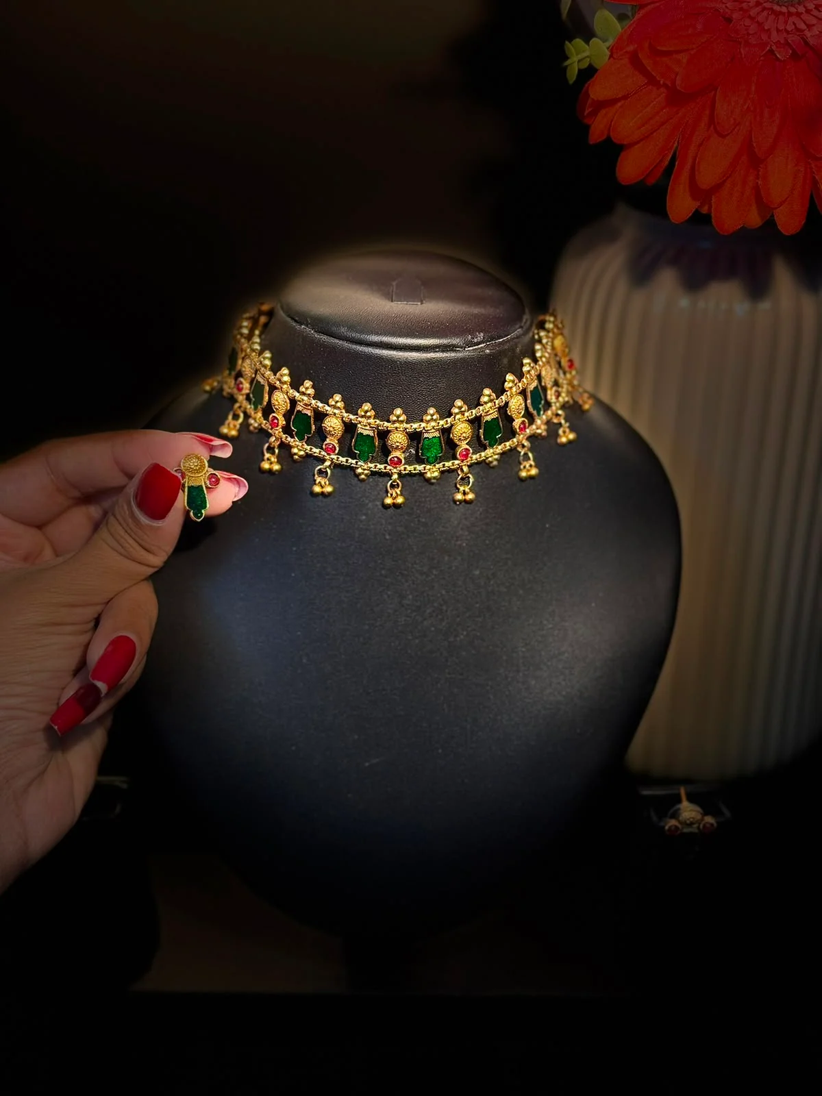 Latest Alankara antique-gold choker with deep emerald panels and small gold drops